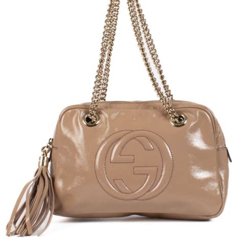 Gucci designer clothes, bags, accessories Labellov Buy and Sell 